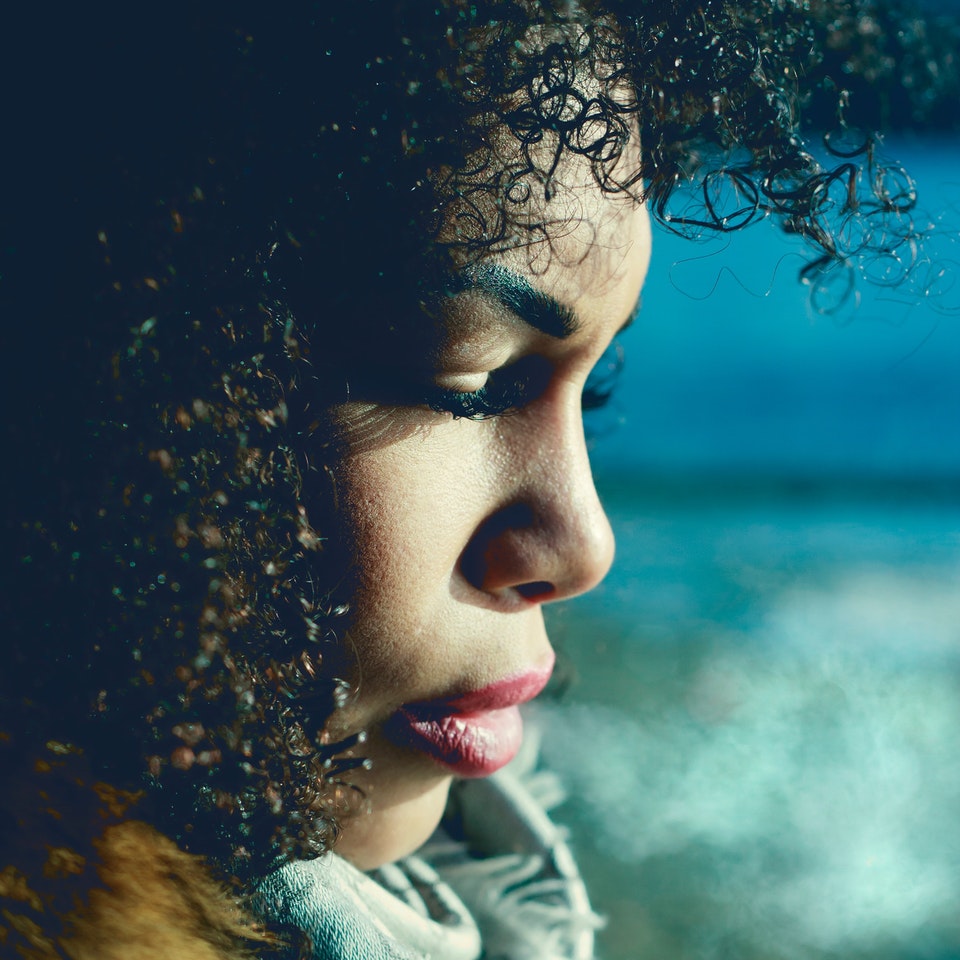 Woman with her eyes closed